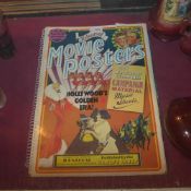 A 1970`s book '50 Years of Movie Posters from Hollywood's Golden Era'