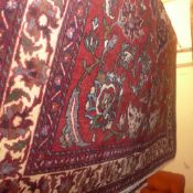 An extremely fine central Persian Isfahan rug with central floral pendant medallion on a