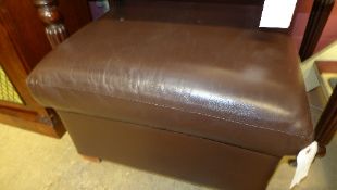 A cognac leather box footstool on block feet