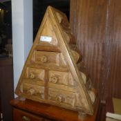 A pine pyramid form chest
