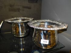 A pair of large silver plated embossed coasters