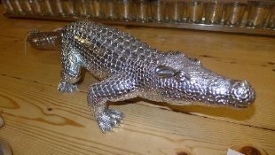 A chromium model crocodile
