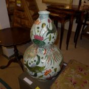 A pair of large gourd vases with fish decoration