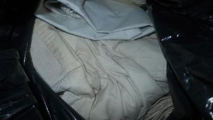 A collection of double lined cream colour cotton curtains