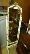 A white painted and parcel gilt cheval mirror
