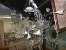 A pair of modern spider ceiling light