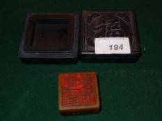 A Chinese soapstone seal in a carved soapstone box