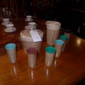 A 1950s American drinks set  including ice bucket, jug and glasses