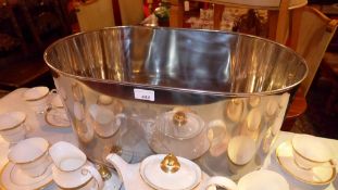 A large silver plated champagne bath with inscribed Lily Bollinger quote