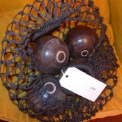 A set of four old boules