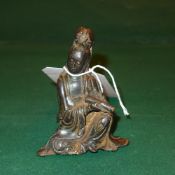 A Chinese cast iron figure of Guan Yin