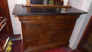 A C19th French figured walnut commode chest with black marble top above four drawers on bracket