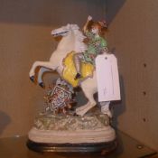 A painted spelter model of a warrior on horseback