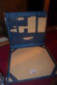A 1950's blue faux leather folding writing set