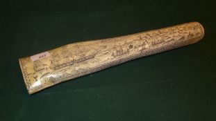 A faux scrimshaw with extensive engraved detail of whaling scenes