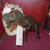 A bronze model of a Tyranasaurus Rex