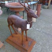 A cast iron life size model deer