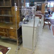 A chromium coat/shirt rack