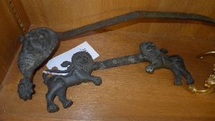 An Indian bronze cast Ganesh flanked by lions (a/f)