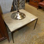 A C20th marble top square low table raised on metal base