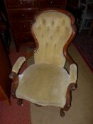 A Victorian walnut gentleman open armchairs upholstered in button fabric cabriole supports W 44 D 35