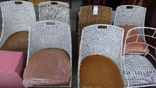 A set of six conservatory Lloyd Loom tub chairs and a similar
