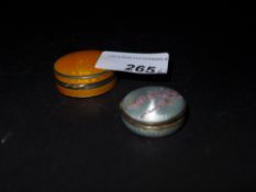A hallmarked sterling silver and orange guilloche enamel Art Deco compact together with a similar