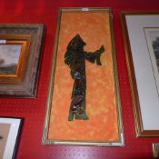 A resin abstract sculpture in a gilt frame