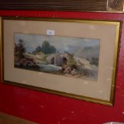 A print after a watercolour of Brecon Bridge, Wales glazed and framed