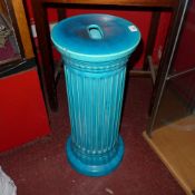 A Victorian Burmantofts art pottery jardinaire stand with a turquoise glaze