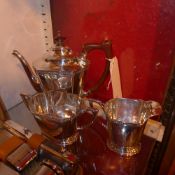 A hallmarked silver three piece tea set assayed in Birmingham