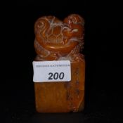 A Chinese soapstone seal decorated with a tortoise