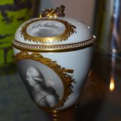 A C1790's Meissen porcelain cup and cover decorated with a portrait in a pictorial reserve ( lid a/f