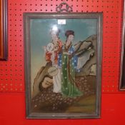 A Japanese painting on glass of two ladies on a hillside in a hardwood frame