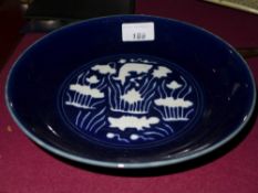 A Chinese blue and white porcelain dish decorated with fish with a six character mark to the base