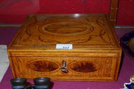 A Neoclassical rectangular work box with inlaid detail incorporating an oval cartouche and swags