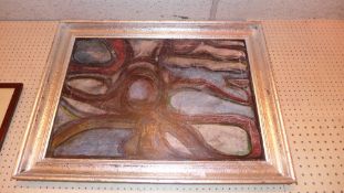 An oil on canvas abstract in a silvered frame marked 1932  verso