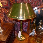 A pair of green Toleware table lamps decorated with flowers