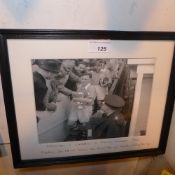 A framed print of a photograph of The Arsenal FA Cup Winning Team showing Joe Mercer leaving The