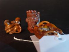 Three carved wood netsuke
