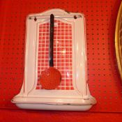 A French enamelled wall hanging untensil rack