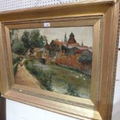 An early C20th Joseph Henderson oil on canvas landscape scene in gilt frame