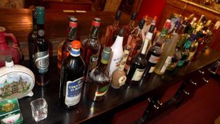 A large collection of various spirits and liqueurs