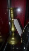 A pair of C19th brass candlesticks