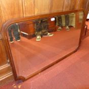An Edwardian inlaid mahogany mirror with bevelled plate