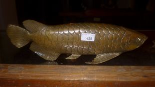 A brass model of an Amazonian fish