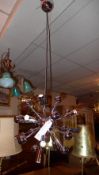 A nickel plated contemporary designer hanging light