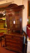A C19th French oak dresser fitted pair of glazed panel doors above two short and three long