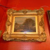 An oil on copper country cottage with shepherd and flock to the fore with overhanging trees signed