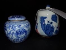 Two Chinese blue and white porcelain jars one decorated with figures the other with Chinese